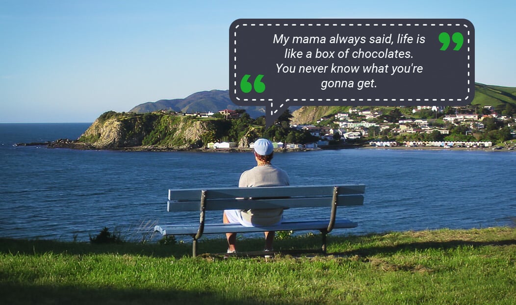 Milos sitting on a blue bench looking over Titahi Bay Beach