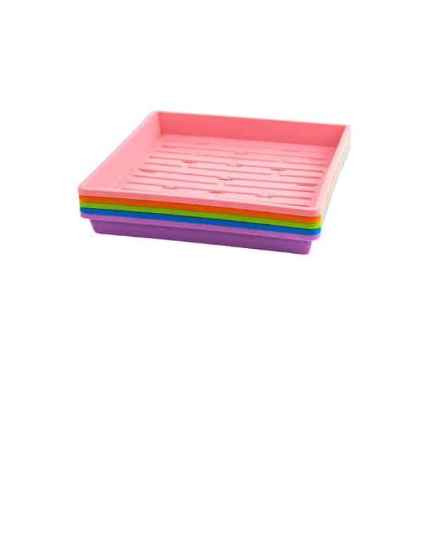 Stack of colored 1010 microgreen trays from bootstrap farmer