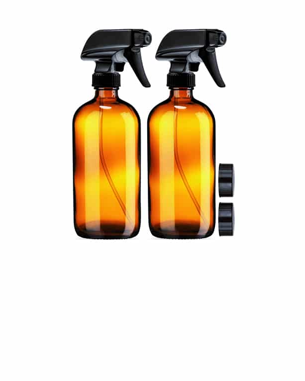 Two amber hand-held water spray bottles